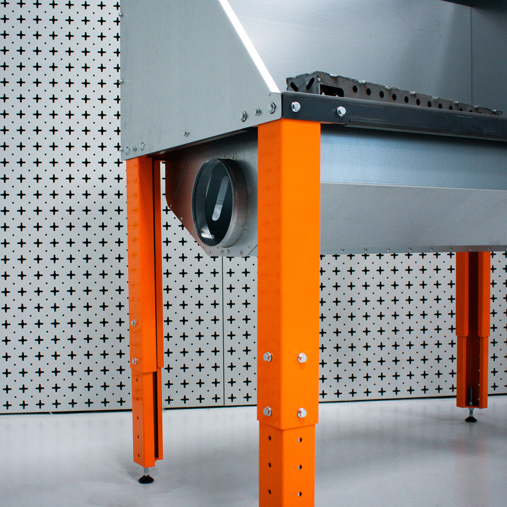 Plasma cutting table with extraction port on a white background
