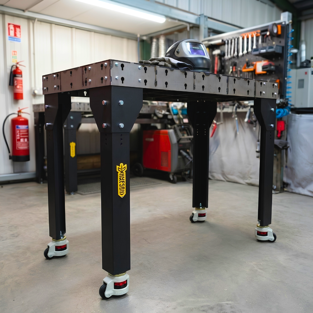 Welding table with black legs in an industrial workshop