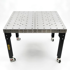 Large welding table with black legs in a white background