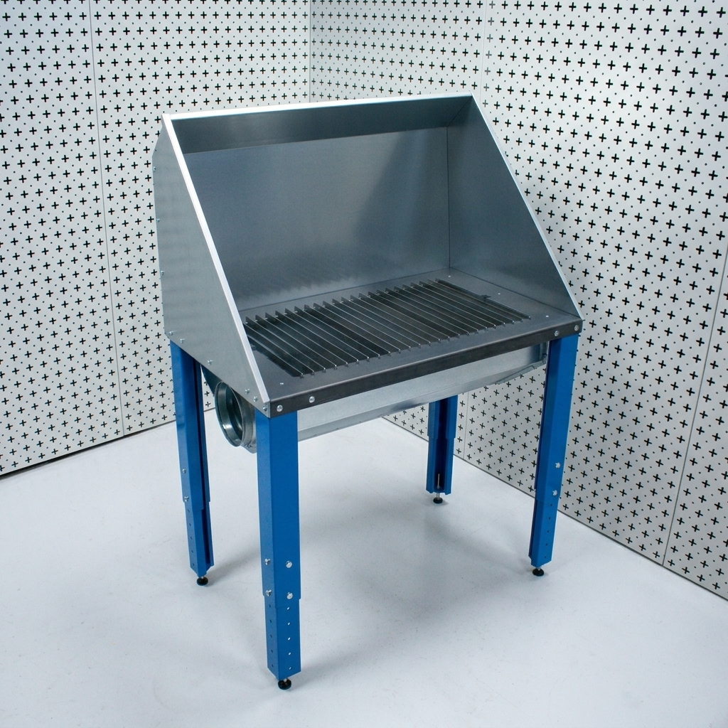 Plasma cutting table with perforated work surface on a white background