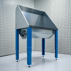 Plasma cutting table with extraction ducting port on a white background