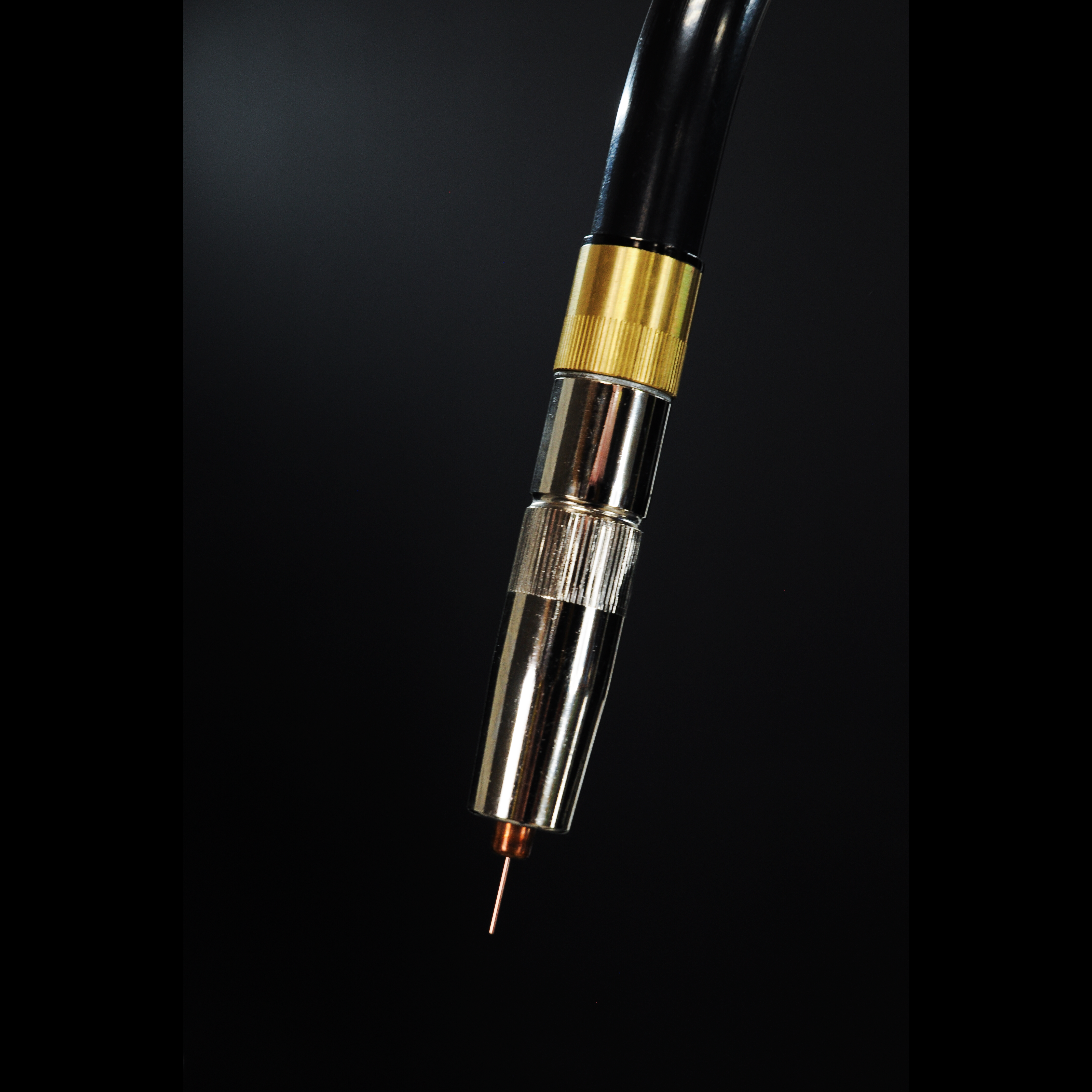 Close-up of MIG welding torch tip