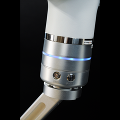 Close-up of WeldBot robotic arm joint with programing buttons 
