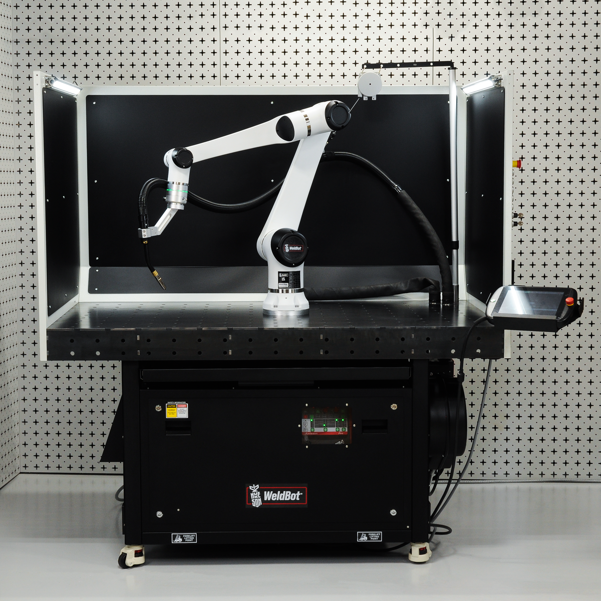 Nukeson WeldBot UK robotic welding workstation with HanBot PRO cobot on steel fixture table
