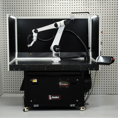 Nukeson WeldBot UK robotic welding workstation with HanBot PRO cobot on steel fixture table