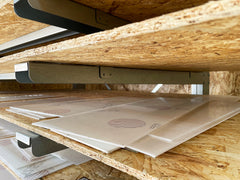 Closeup of the detail on the shelving arms of the racking.