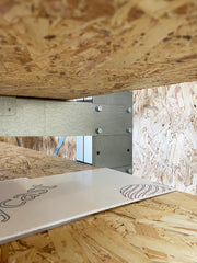 Closeup of the detail on the shelving arms of the racking.
