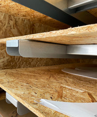 Closeup of the detail on the shelving arms of the racking.