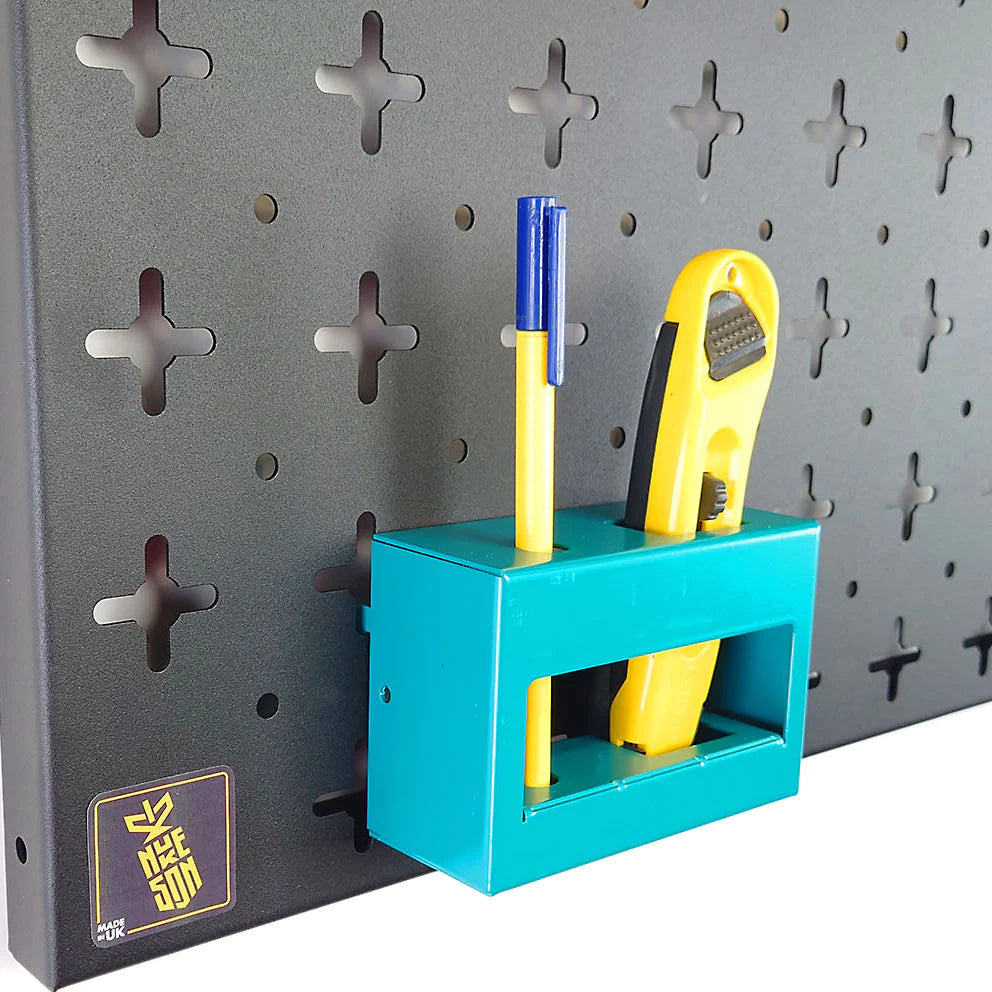 A aqua blue Nukeson pen & box cutter attachment, with a pen and box cutter, mounted on a black tool organiser